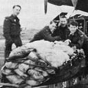On the airfields of Nos. 1 and 3 Groups, the military men literally worked day and night to get the much needed food to Holland.